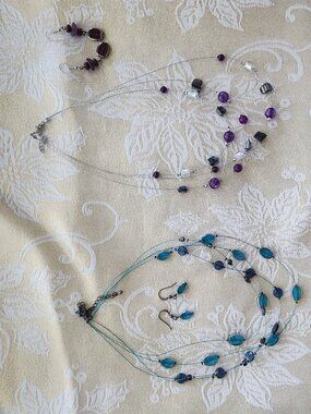 Set of two necklaces with matching earrings bag 7